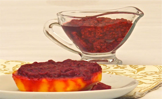 foto da receita Medalhão de manga com calda de frutas vermelhas